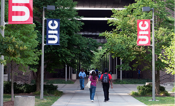 Students walking through campus core